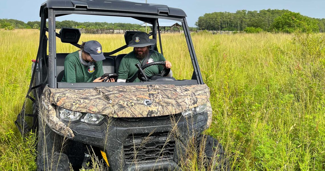 Mark and Hillary Driving A UTV — Seminole Tribal Historic Preservation Office